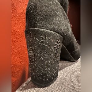 Sued zip boot studded heel